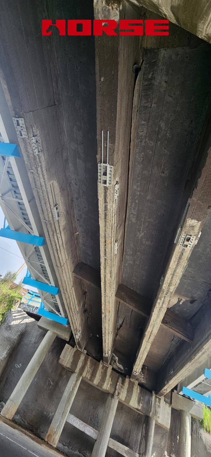 Strengthening a Critical Bridge in Ecuador by FRP Post-tension System