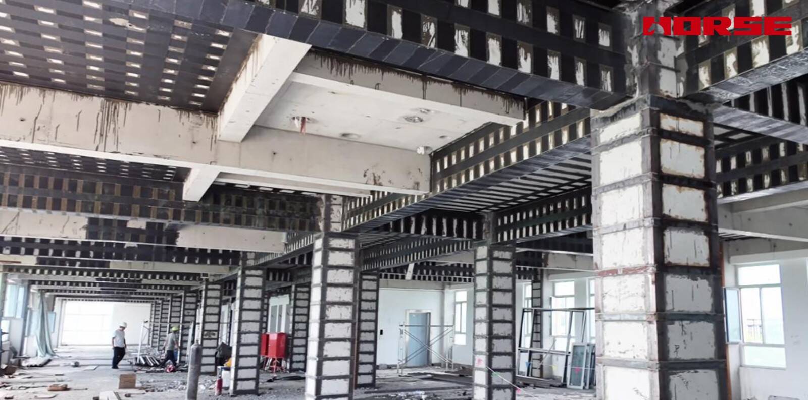 Structural Retrofit for Commercial-to-Senior-Care Conversion -- Carbon Fiber & Steel Jacketing