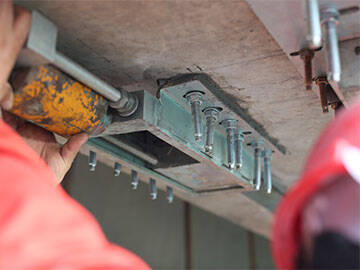 Prestressed FRP strengthening system - Bridge