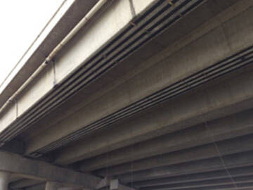 Reinforcement concrete bridge with prestressed CFRP rebar